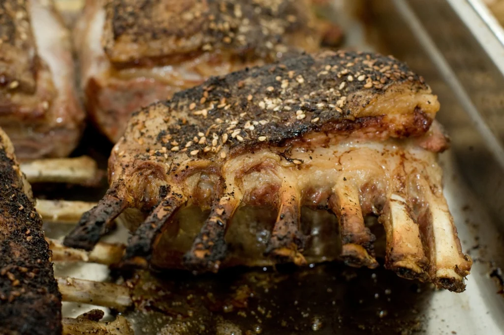 Browning lamb cubes in a hot skillet for slow cooker stew